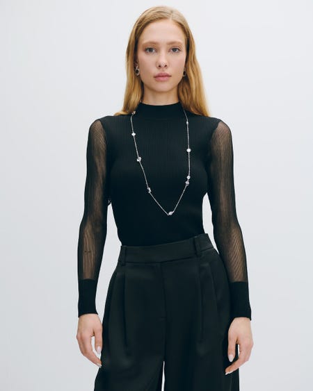Suéter Negro Tejido Canalé Mangas Con Transparencia